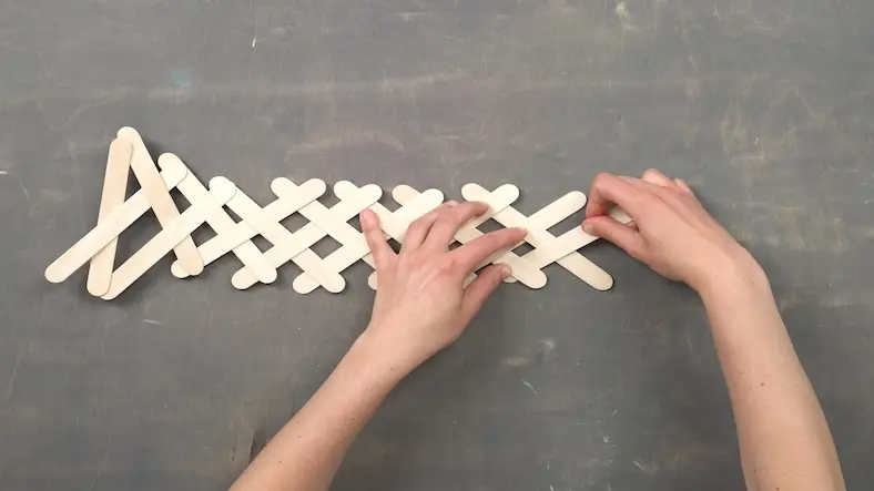 Craft stick chain reaction, kids science experiment