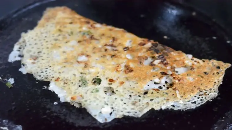 How to cook Onion Rava Dosa at home - Onion Rava Dosa Recipe